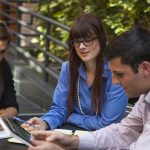 Employment Law Changes 2017 Employees working around a table. Employment Law Changes 2017